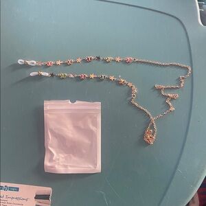 NWOT colorful gold star butterfly glasses chain